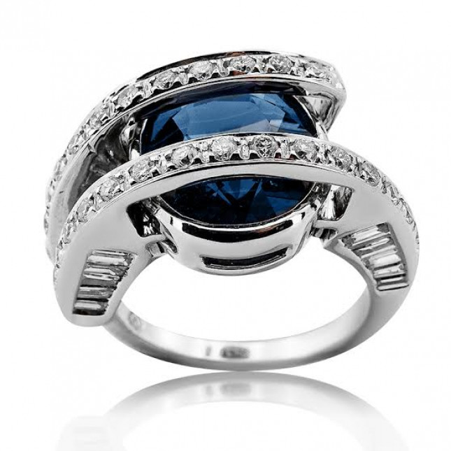White Gold Ring With Oval Cut Sapphire And Brilliant/Baguette Cut Diamonds