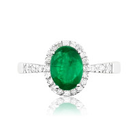 White Gold Ring With Oval Cut Emerald And Brilliant Cut Diamonds
