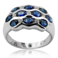 White Gold Ring With Oval Cut Sapphire And Brilliant Cut Diamonds