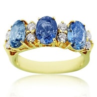 Yellow Gold Trinity Ring With Oval Cut Sapphire And Brilliant Cut Diamonds