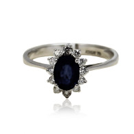 White Gold Ring With Oval Cut Sapphire And Brilliant Cut Diamonds