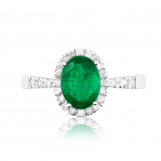 White Gold Ring With Oval Cut Emerald And Brilliant Cut Diamonds